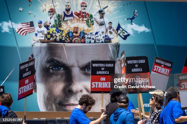 People picket outside of FOX Studios on the first day of the Hollywood writers strike on May 2, 2023 in Los Angeles. Scripted TV series, late-night...