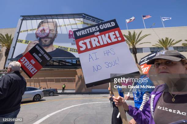 People picket outside of FOX Studios on the first day of the Hollywood writers strike on May 2, 2023 in Los Angeles. Scripted TV series, late-night...