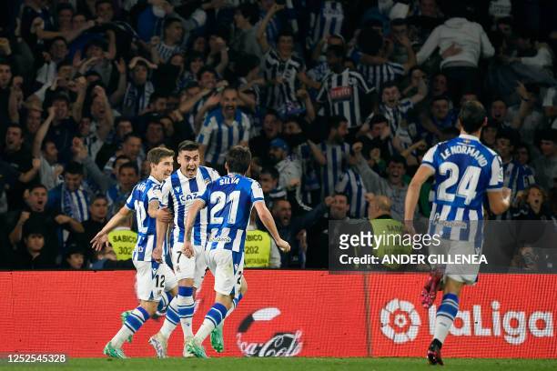 Real Sociedad's Spanish forward Ander Barrenetxea celebrates scoring his team's second goal during the Spanish league football match between Real...