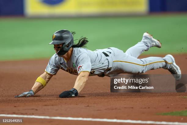 Connor Joe of the Pittsburgh Pirates slides into third base against the Tampa Bay Rays during the fourth inning at Tropicana Field on May 2, 2023 in...