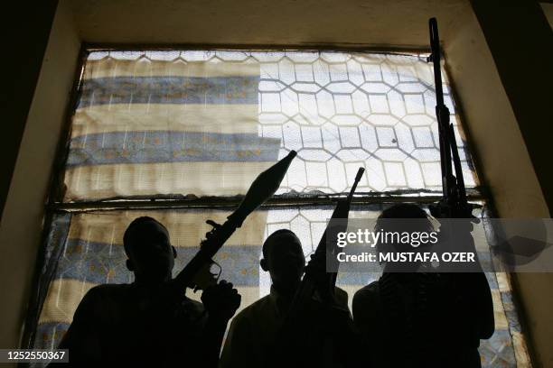 Soldiers from the rebel Sudanese Liberation Army meet at the party's offices in Nyala, 13 August 2007, the capital of Darfur, western Sudan. A key...