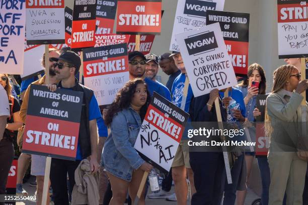 People picket outside of Paramount Pictures on the first day of the Hollywood writers strike on May 2, 2023 in Los Angeles. Scripted TV series,...