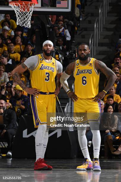Anthony Davis and LeBron James of the Los Angeles Lakers talk during the game against the Golden State Warriors during Game One of the Western...