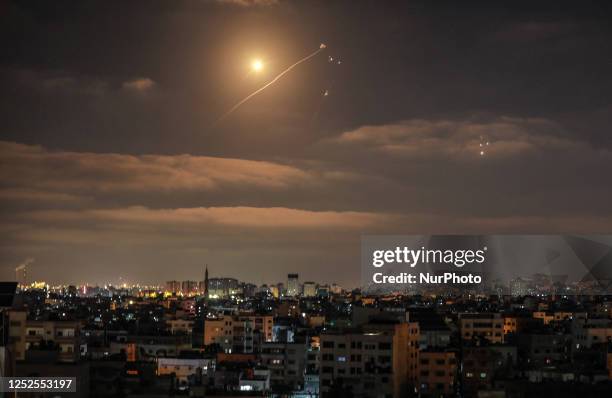 Israel's Iron Dome air defence system intercepts rockets fired from the Gaza Strip above Gaza City on the Palestinian enclave on May 3 following a...