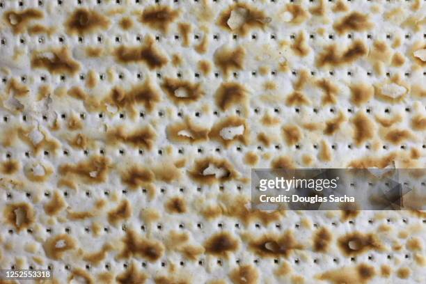 jewish matzos, the traditional passover cracker - matzah stock-fotos und bilder