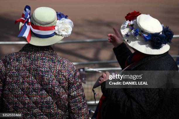 Wellwishers camping out along the procession route are pictured with the their tents and camping chairs on The Mall, in central London, on May 3 as...