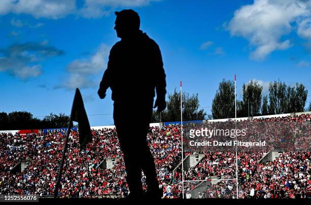 Cork , Ireland - 30 April 2023; Supporters are seen behind a silhoutte of Waterford manager Davy Fitzgerald during the Munster GAA Hurling Senior...