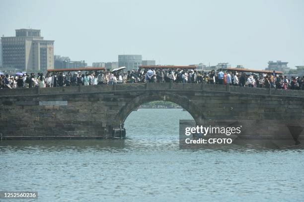 Tourists flock to the West Lake in Hangzhou, Zhejiang province, China, April 30, 2023. May 3, 2023 - According to the data center of the Ministry of...