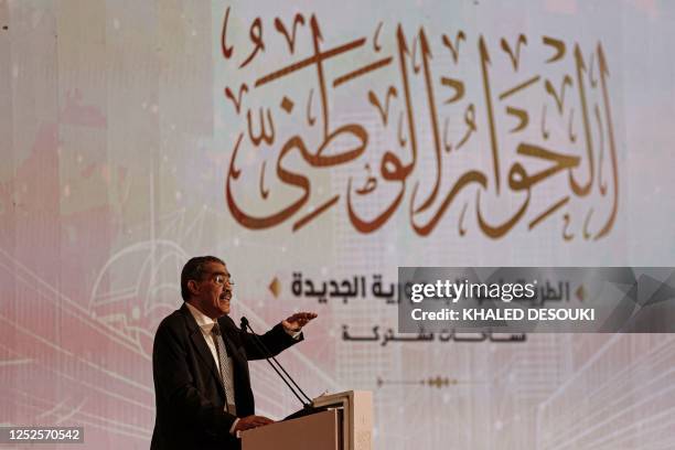 Egypt's General Coordinator of the National Dialogue Diaa Rashwan addresses the representatives of syndicates, political forces, and NGOs during a...