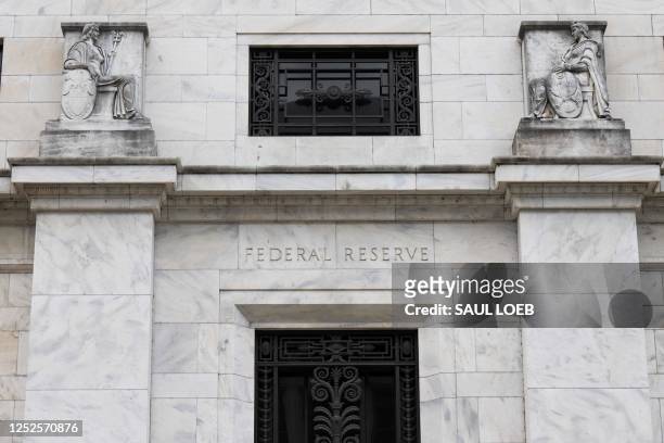The US Federal Reserve Building is seen in Washington, DC, May 3, 2023. - The US Federal Reserve is widely expected to raise its benchmark lending...
