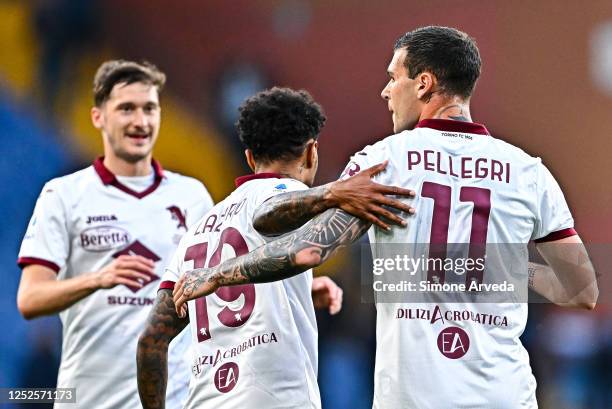 Pietro Pellegri of Torino celebrates with his team-mate Aleksey Miranchuk and Valentino Lazaro after scoring a goal during the Serie A match between...