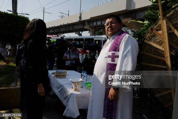 Priest in front of relatives and friends of victims who died on the night of 3 May 2021 after the collapse between the Tezonco and Olivos stations of...