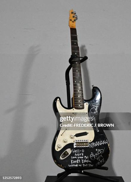 Musician Kurt Cobain's smashed Fender Stratocaster is dispalyed at Julien's Auctions in Gardena, California on May 2 ahead of Julien's "Music Icons"...