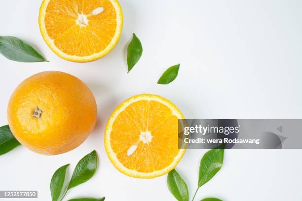 flat lay decoration of fresh orange slice fruits - オレンジ ストックフォトと画像