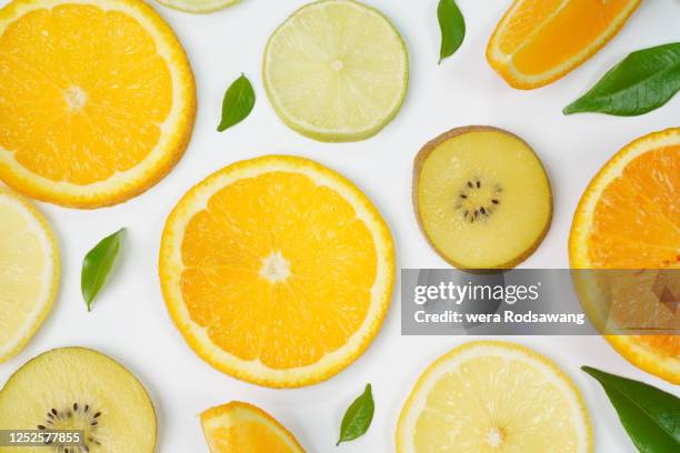 slice of fruit - lemon lime top stock pictures, royalty-free photos & images