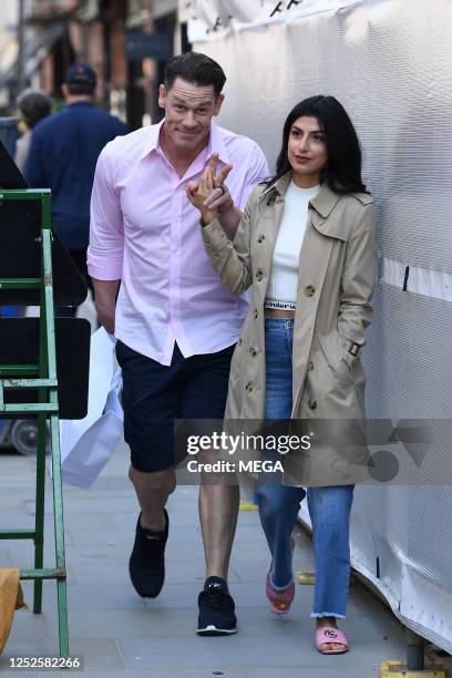 John Cena and Shay Shariatzadeh are seen out and about on May 3, 2023 in London, United Kingdom.