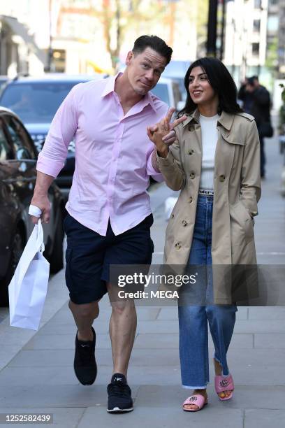 John Cena and Shay Shariatzadeh are seen out and about on May 3, 2023 in London, United Kingdom.