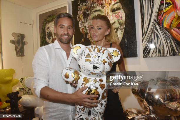 Presenter Julien Benedetto and Julia Battaia attend "Jayet Et Ses Ours" Exhibition Preview at Galerie Art and Sound on June 25, 2020 in Paris, France.