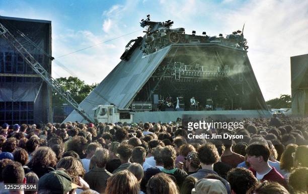 View of the Pyramid stage at the Glastonbury festival at Worthy Farm on June 1990 in Pilton, United Kingdom.