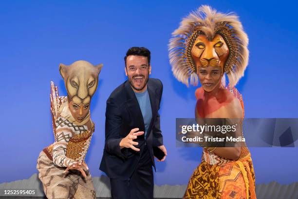 Jessica Mears as Nala, Giovanni Zarrella and Hope Maine as Simba after the Der König der Löwen" musical 15 million visitors gala event at Stage...