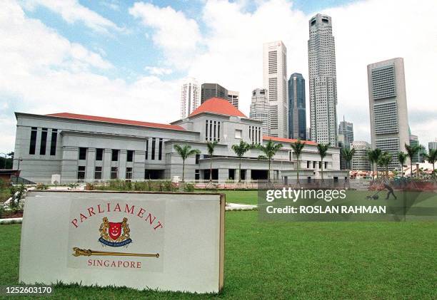 Singapore's nearly-completed new Parliament complex sits against the highrise financial district in High Street 28 June 1999. The 80-million...
