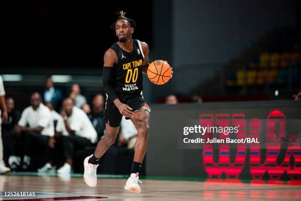 Zaire Wade of the Cape Town Tigers dribbles the ball during the game against the CFV - Beira on May 3, 2023 at the Dr. Hassan Moustafa Sports Hall in...