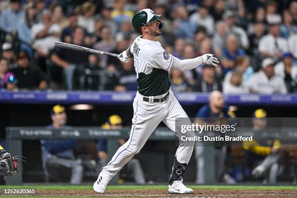 Kris Bryant of the Colorado Rockies hits a two-run home run in the seventh inning against the Milwaukee Brewers at Coors Field on May 3, 2023 in...