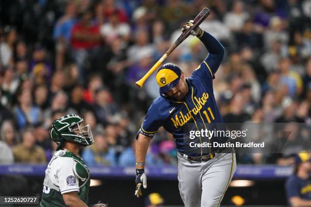 Rowdy Tellez of the Milwaukee Brewers reacts after popping out with a runner at third base in the seventh inning against the Colorado Rockies at...