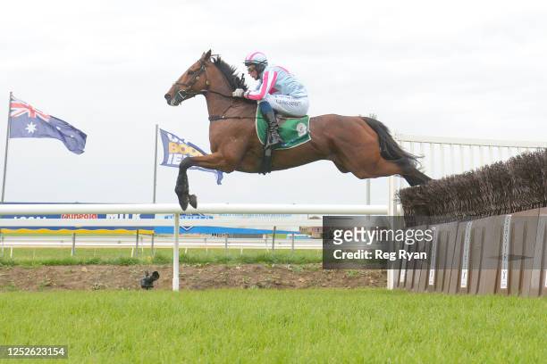 Rockstar Ronnie ridden by Chris McCarthy clears a steeple on the way to winning the Brandt Grand Annual Steeplechase at Warrnambool Racecourse on May...