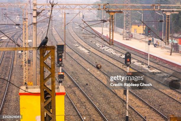 empty railway station and train tracks in india - sciopero foto e immagini stock