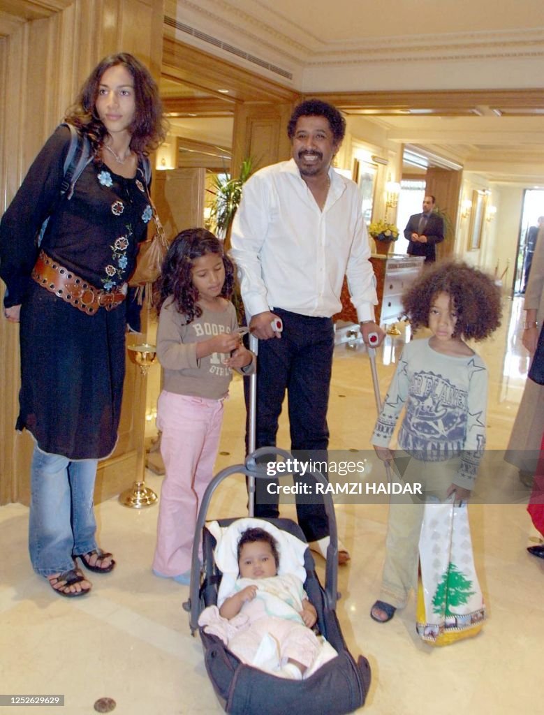 Algerian Rai star Khaled and his wife Samira arrive with their three ...