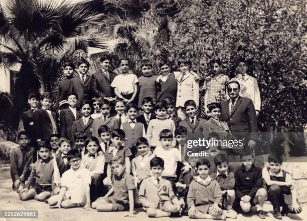 Lebanese-born French Pianist Abdel Rahman el-Bacha is seen in the third row from below in a class photograph at Beirut's College de la Salle in 1967,...