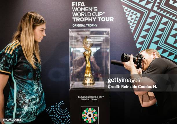 Jule Brand of Germany poses with the trophy during the FIFA Women's World Cup 2023 Trophy Tour on May 3, 2023 in Berlin, Germany. Australia and New...