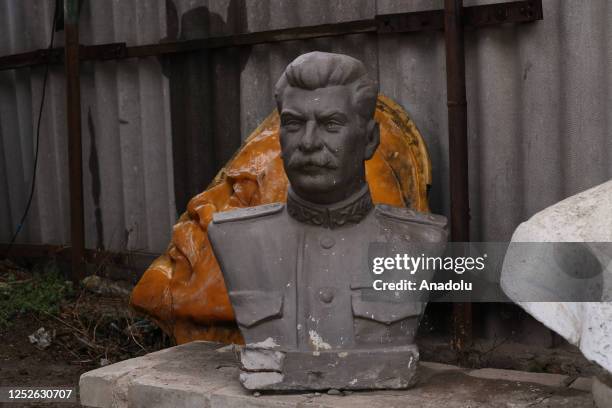 View of Stalin's portrait monument at a yard of a carving workshop in Kharkiv, Ukraine on March 16, 2023. 73-year-old Volodymyr Linivy , started...