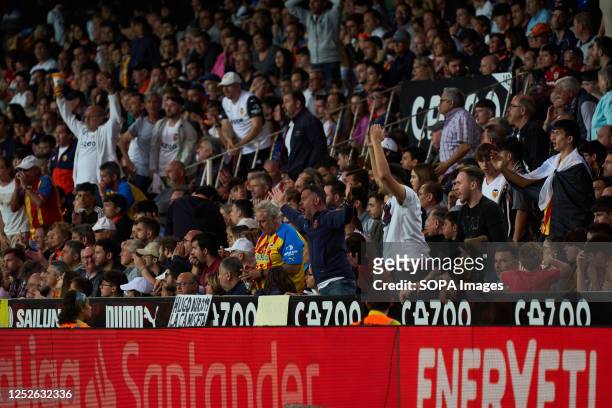 Fans of Valencia CF seen cheering during the LaLiga Santander Regular Season Round 33 between Valencia and Villarreal at Mestalla Stadium. Final...