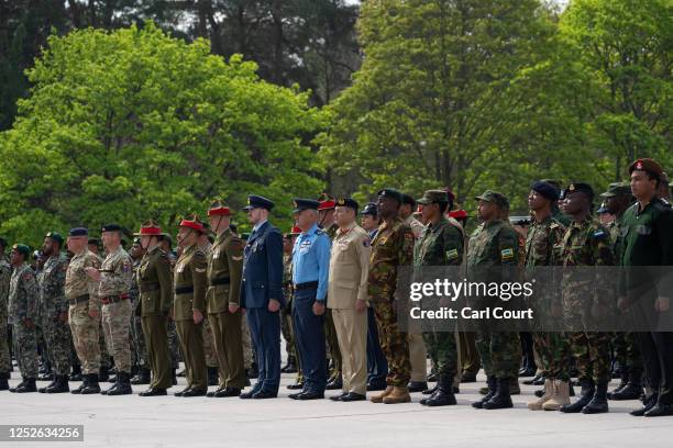 Commonwealth troops wait to receive commemorative coins during a military parade for representatives of the Commonwealth taking part in the...