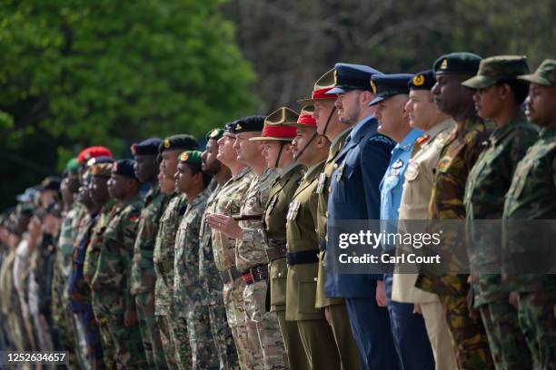 Commonwealth troops wait to receive commemorative coins during a military parade for representatives of the Commonwealth taking part in the...