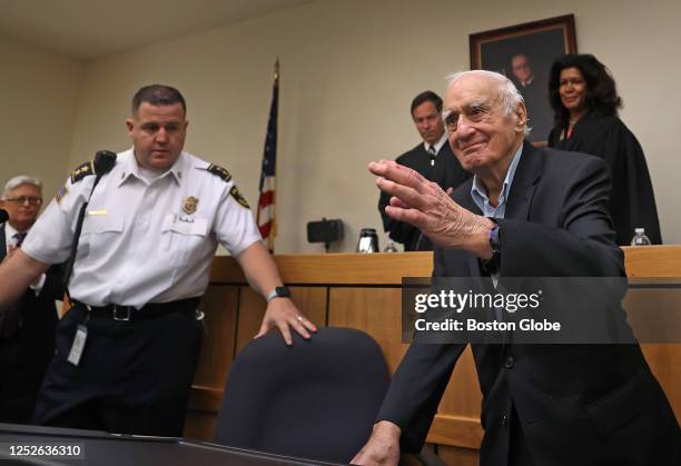 Giving a wave as he arrived in the courtroom, former Lt. Gov. And Attorney General Frank Bellotti, right, celebrated his 100th birthday at a Law Day...