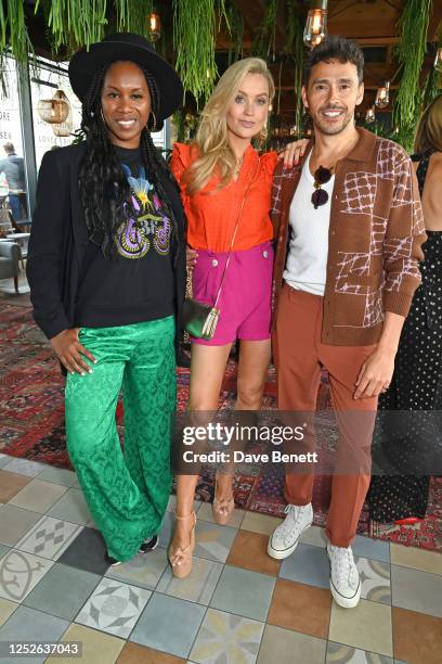 Aicha McKenzie, Laura Whitmore and Simon Atkins attend the launch of Laura Whitmore's debut collection for Love & Roses held on her birthday at...