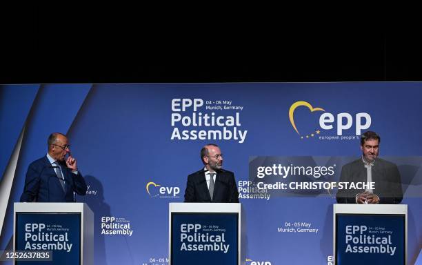 Bavaria's State Premier and leader of the Christian Social Union party Markus Soeder speaks next to Chairman of the center-right European People...