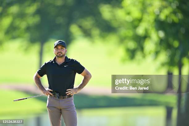 Jason Day of Australia stands on the 15th green during the first round of the Wells Fargo Championship at Quail Hollow Club on May 4, 2023 in...