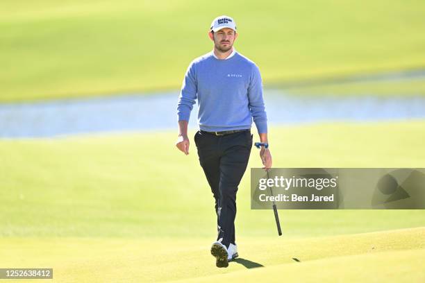Patrick Cantlay walks near the 15th green during the first round of the Wells Fargo Championship at Quail Hollow Club on May 4, 2023 in Charlotte,...
