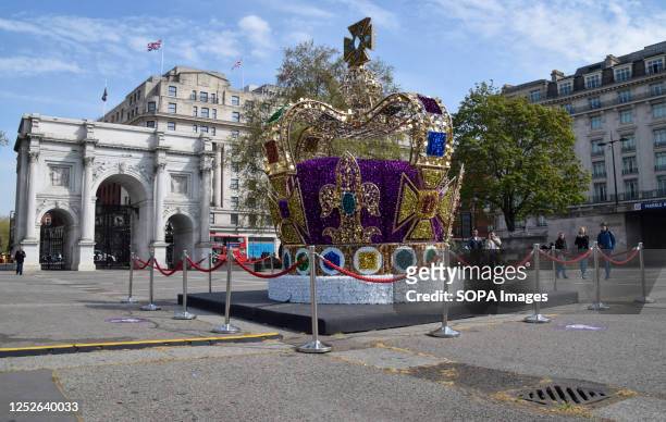 Huge crown installation decorates Marble Arch ahead of the coronation of King Charles III, which takes place on May 6th.