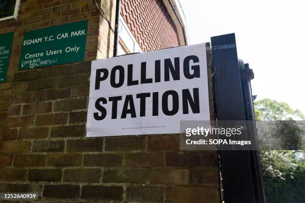 General view of a polling station in Egham, as members of the public go to cast their votes. Elections are being held in 230 of England's 317...
