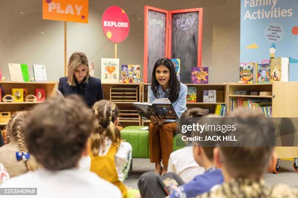 Akshata Murty, wife Britain's Prime Minster and Ukraine's First Lady Olena Zelenska read to Ukrainian children during a visit to The British Library...
