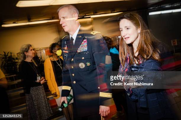 Defense Intelligence Agency Director Lt. Gen. Scott Berrier, left, and Director of National Intelligence Avril Haines walk through the Senate Subway,...