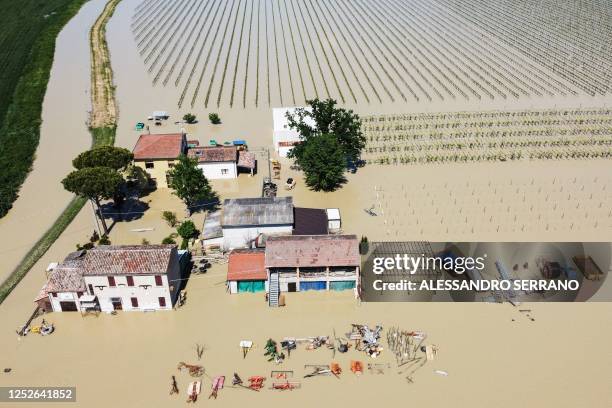 An aerial view shows the flooded village of Borgo di Villanova, near Ravenna, northern Italy, on May 4, 2023. - Two people died after 48 hours of...