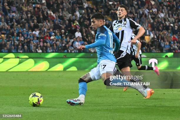 Napoli's Uruguayan defender Mathias Olivera challenges Udinese's German midfielder Lazar Samardzic during the Italian Serie A football match between...