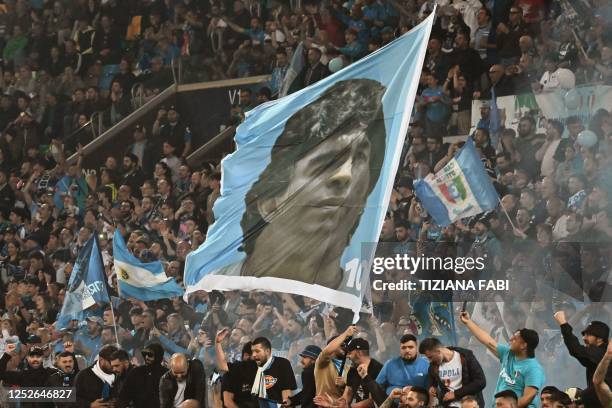 Napoli fans celebrate after the Italian Serie A football match between Udinese and Napoli on May 4, 2023 at the Friuli stadium in Udine. - Napoli...