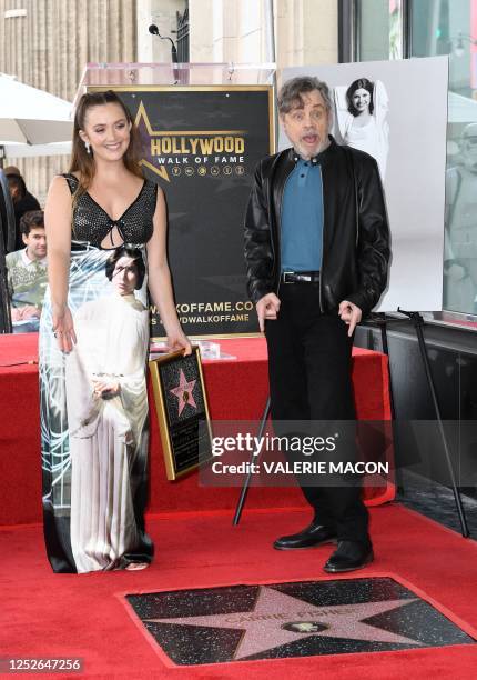 Billie Lourd, daughter of US actress Carrie Fisher, and actor Mark Hamill at the ceremony for actress Carrie Fisher being honored posthumously with a...